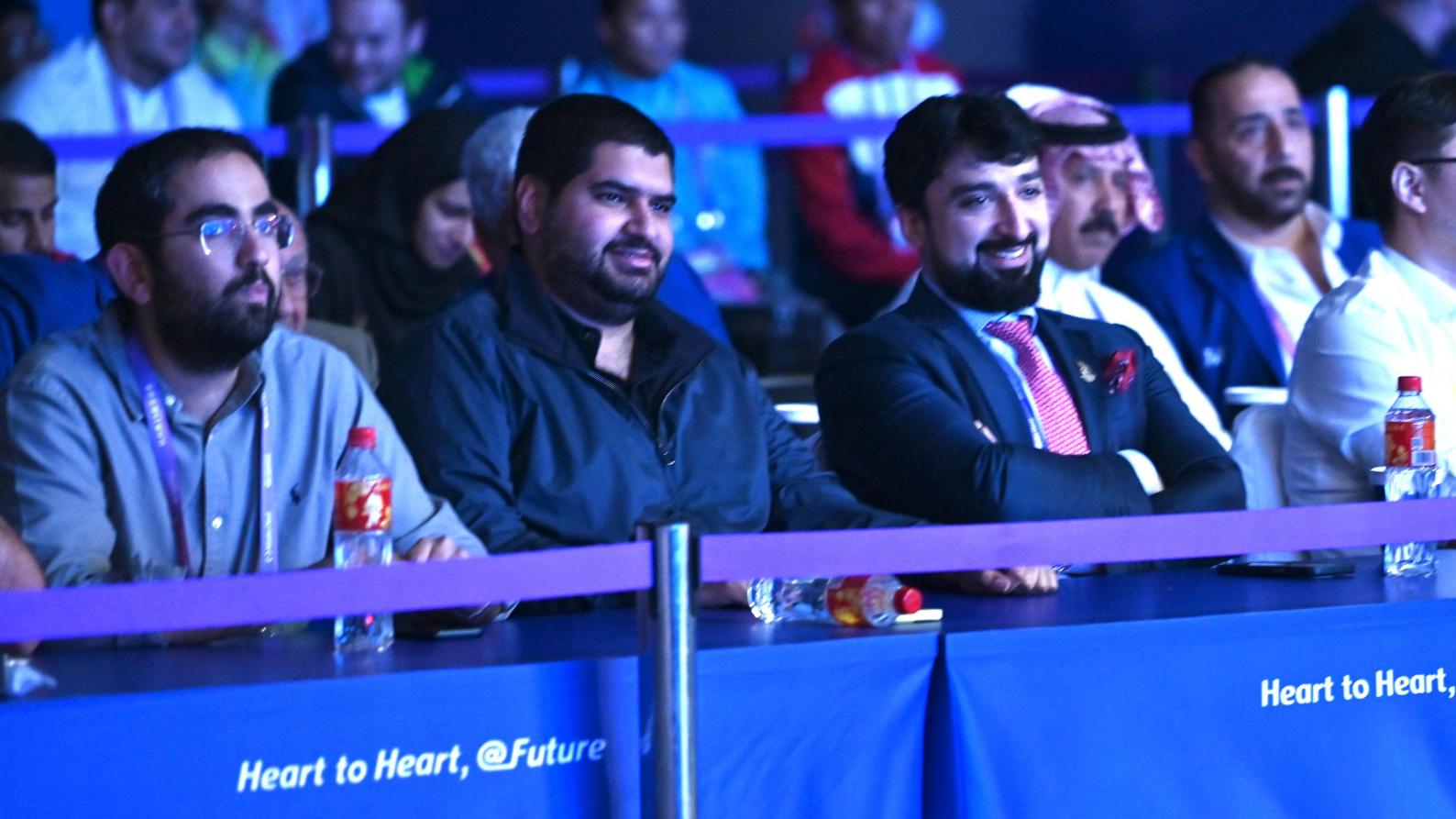 Issa bin Ali witnesses the weightlifting competitions at the Asian Games